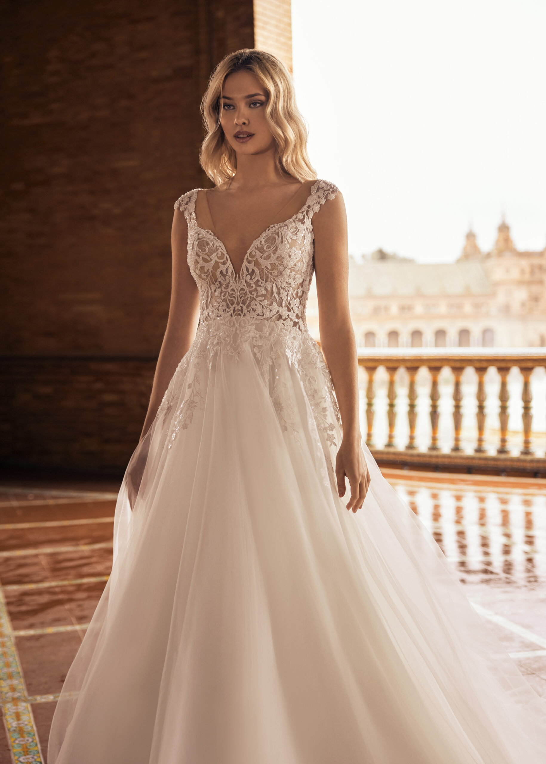 A wedding dress with sparkly lace details | Libelle Bridal